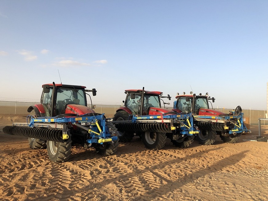 Ready for cleaning: three SunBrush Mobil solar panel cleaners at the Benban solar park.
