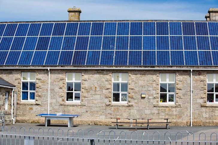 Solar panels on a school roof in St Just, Cornwall/UK.