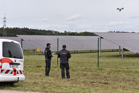 Drone-based inspection of a solar array as part of the COSIMA research project.