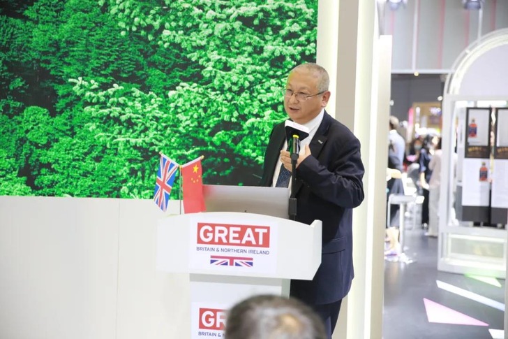 LONGi's founder and president Li Zhenguo at the UK booth at this year’s China International Import Expo officially announcing that his company is to make a greater contribution to carbon action.