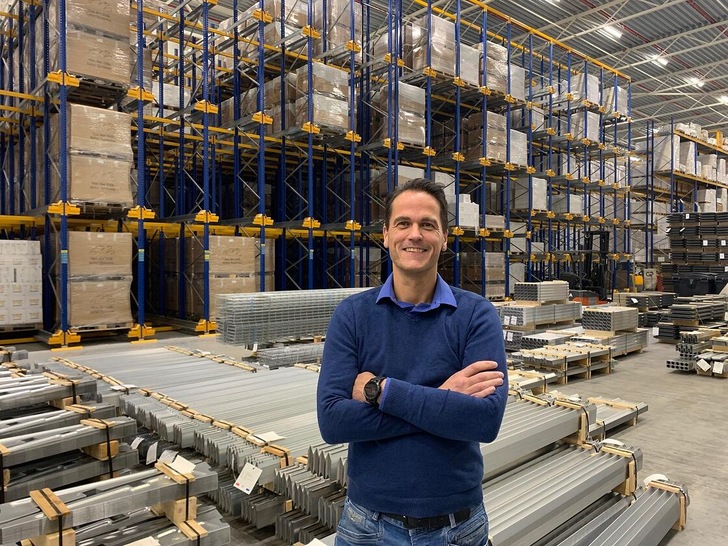 Denis de Vette, Managing Director of Van der Valk Solar Systems, in front of a well-stocked warehouse - despite a challenging supply situation in 2021.