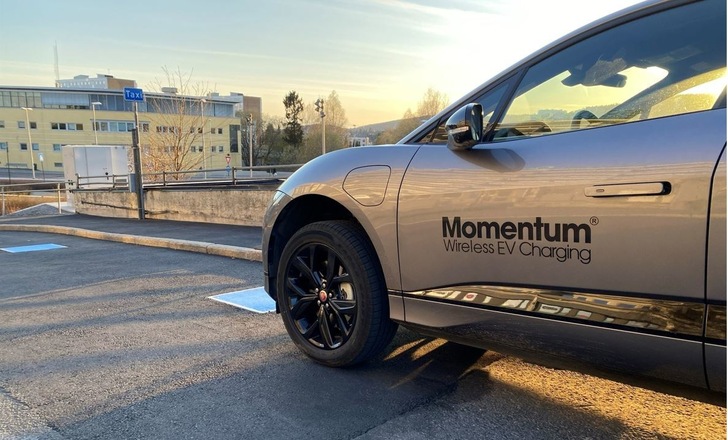 A taxi approaching a 75-kilowatt wireless charger in Oslo, Norway.