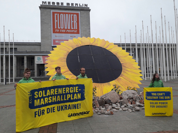 Solar flower in front of the Berlin Exhibition Centre, where international celebrities are meeting for the Ukraine Recovery Conference.