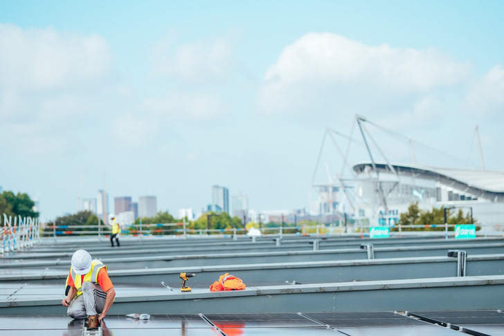 Solar Panels are placed on the roof of the Joie Stadium in Manchester, England.