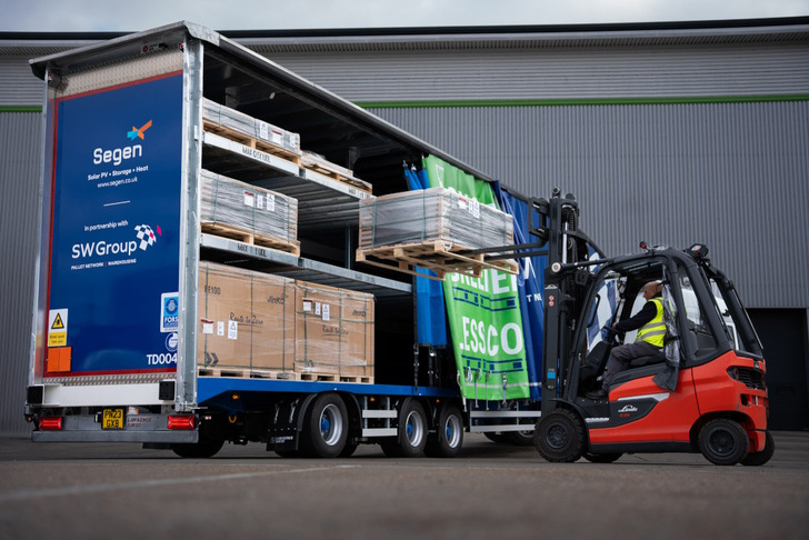Triple deck trailers in front of Segen's distribution warehouse in Medway, Kent (UK).