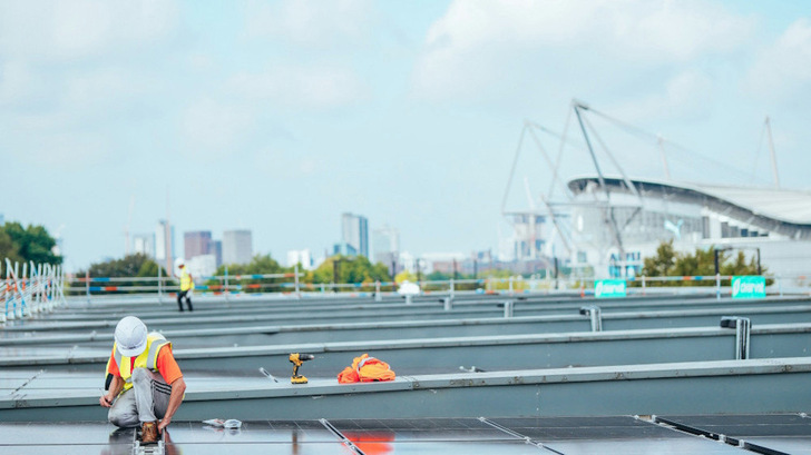 Solar Panels are placed on the roof of the Joie Stadium in Manchester, England.