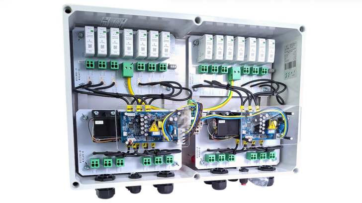 Inside the larger FWS version: surge protection above, emergency-switch circuitry below