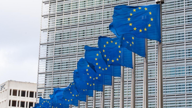EU flags fly outside the Berlaymont in Brussels, where REPowerEU was launched in 2022