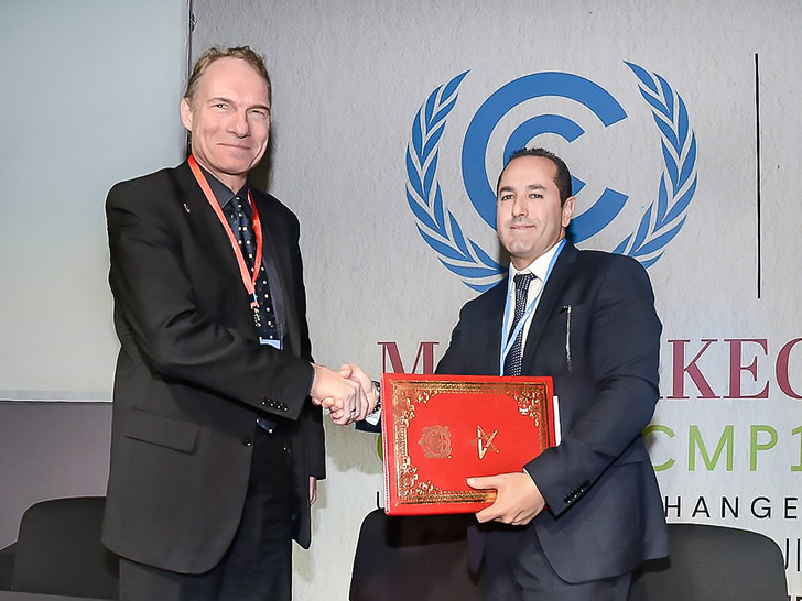 Paul Grunow, Co-founder and Board Member PI Berlin and Badr Ikken, General Director of IRESEN signed a cooperation agreement at the COP 22 climate summit in Marrakech, Morocco.