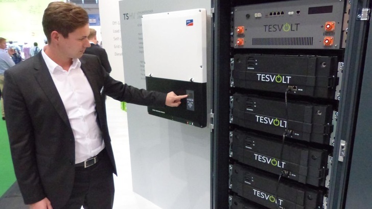 Simon Schandert, Technical Tanager at Tesvolt, in front of the new high-voltage energy storage system TS HV 70.