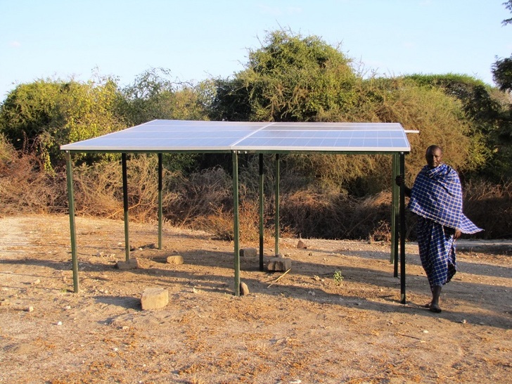 Maasai man with the solar system in Ndedo.