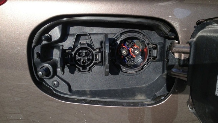 The sockets for charging at a Mitsubishi plug-in hybrid Outlander.