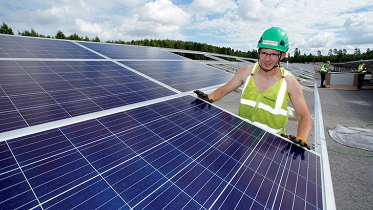 24,000 panels are installed on an open compost field and on roofs at food and meat company Atria in Nurmo/Finland. - © Timo Aalto
