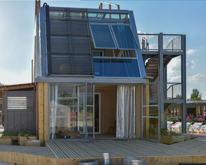 The glass façade heats all of the process water using the energy of the sun. - © Solar Decathlon Europe

