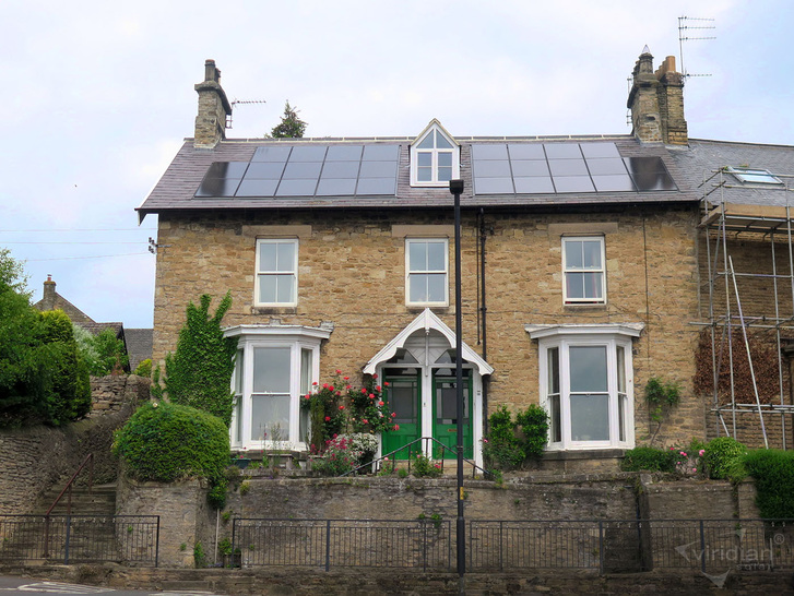 The Clearline Fusion integrates smoothly even into an existing slate roof. - © Viridian Solar

