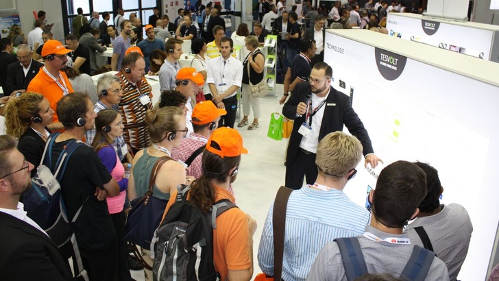 Big crowd during the presentation at the booth of Tesvolt. - © HS
