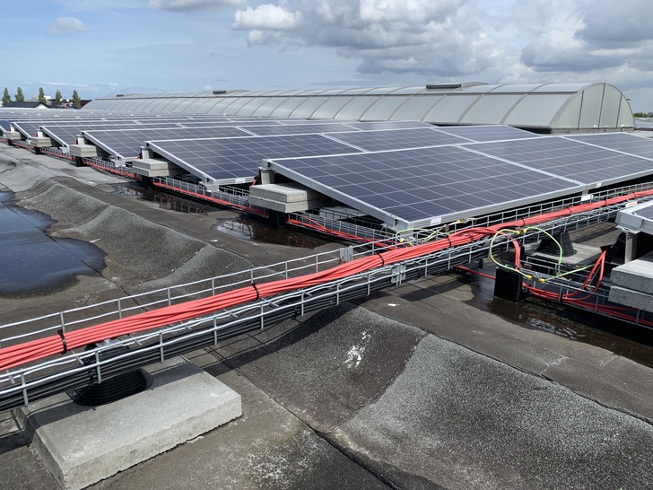 The cable baskets hold all the cables while helping to prevent a build-up of electrical potential. - © Van der Valk Solar Systems
