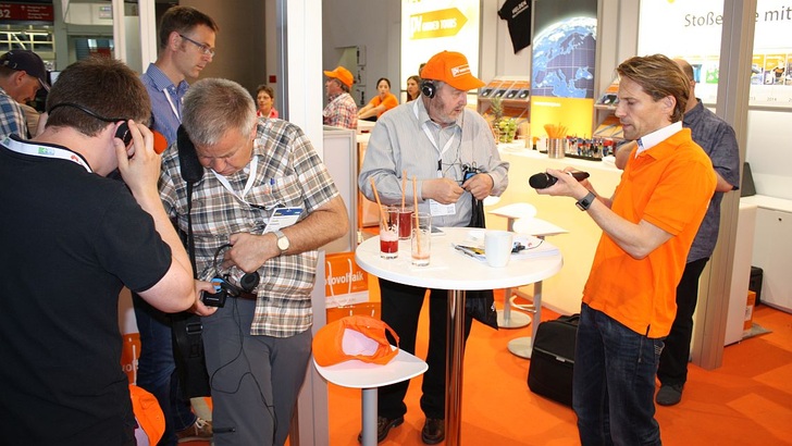 Ready for take-off: Tour members and their guide preparing the audio sets. - © Heiko Schwarzburger
