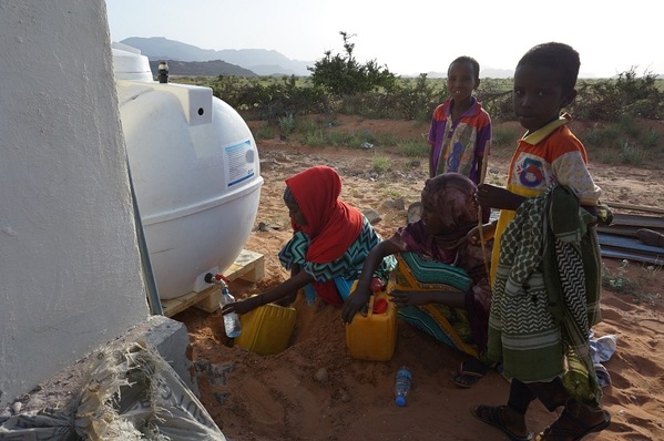 Villagers with the water desinlation system in Beyo Gulan, Somaliland.