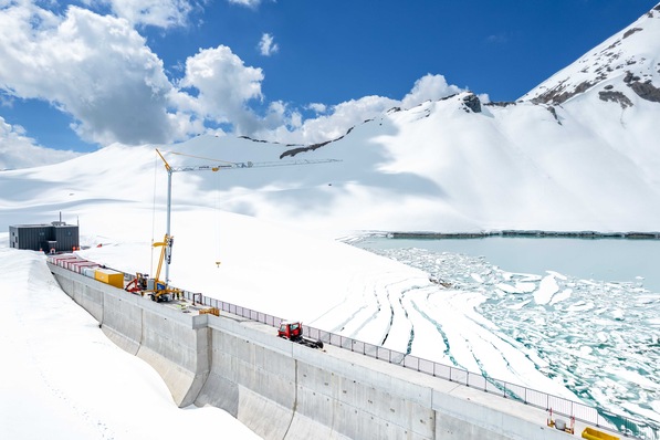 Work officially began with delivery of the crane which will be required for installation of the substructure and solar panels to the wall of the dam.