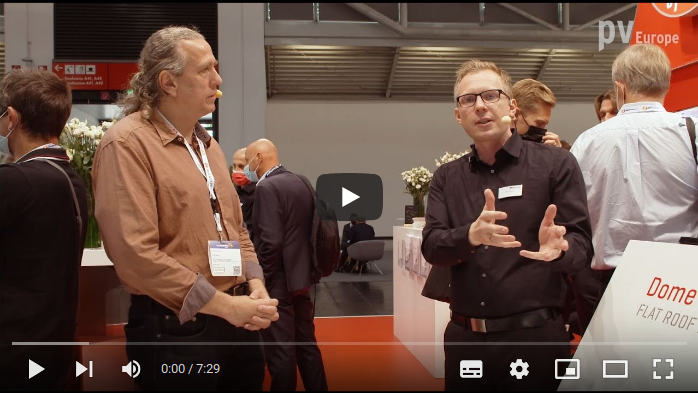 Willem Haag (right) from K2 Systems is talking on the easy and lean installation of solar generators.