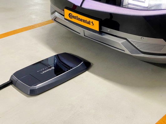 The ground unit of the charging robot can be positioned anywhere in the garage.