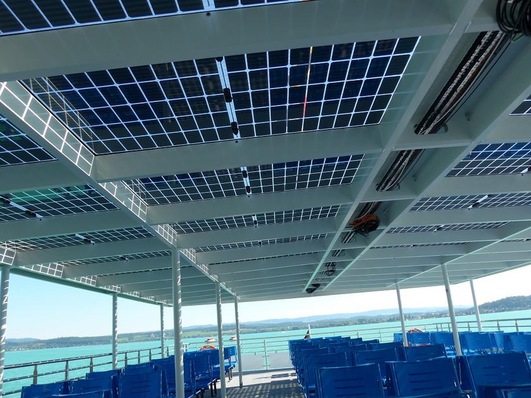 Bifacial solar modules, which use sunlight from both sides, are integrated into the light-filled open deck of the BSB's e-ship. They still need to be wired.
