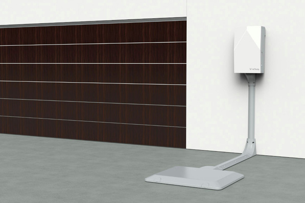  The charging station is laid in the ground and the car can then charge inductively when it is parked above it.