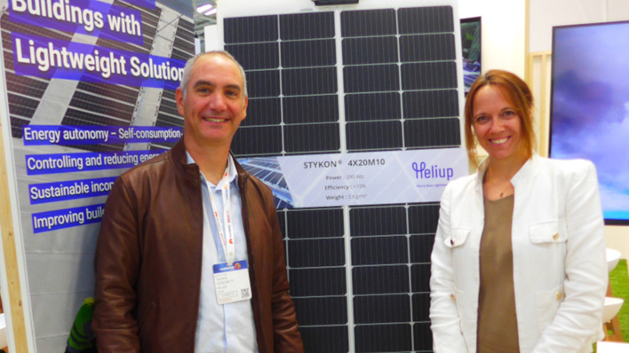 CEO Yannick Veschetti (l.) and COO Maryline Joanny of French manufacturer Heliup showed off their new lightweight solar modules for C&I rooftops.