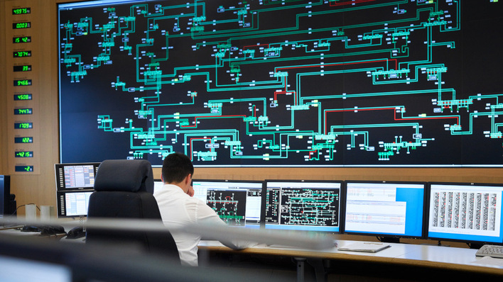 Pondering the direction of power in a modern control room.