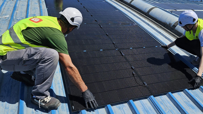 Fossil fuels below, next-gen technology above – placing the modules atop a petrol forecourt.