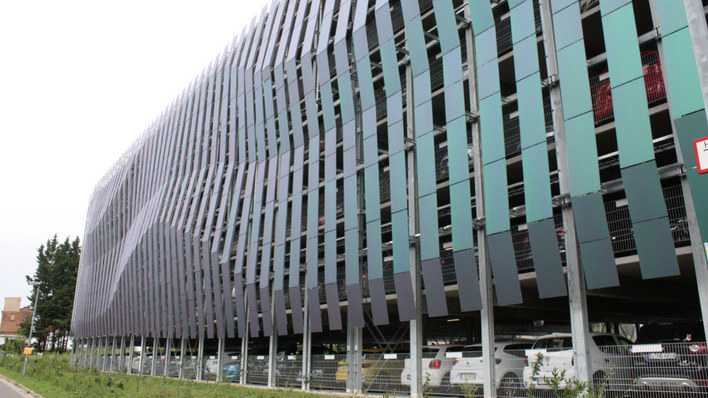 This Leipzig parking garage sports a solar façade, slashing energy costs while powering up EVs in style.