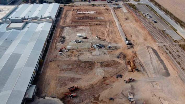 Adjacent to the car plant, a hole in the ground with gigafactory potential