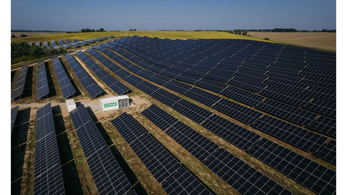 Rows upon rows of solar modules doing the quiet work of decarbonisation