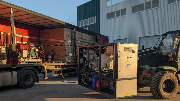 Delivery complete – modules and batteries being unloaded in Kamianets-Podilskyi