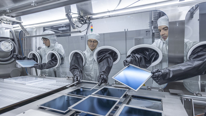 The cleanroom choreography of scaling tandem cells beyond the lab