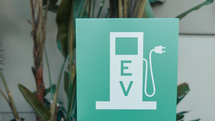 Behind this simple sign, a growing amount of software deciding how fast the plug can work