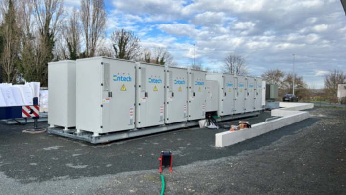 A row of Entech-branded battery cabinets at one of COMAX France's new storage sites