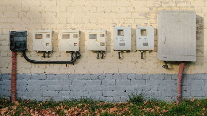 Out with the old, in with the new – a row of meters mid-transition
