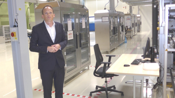 Ed Crossland, CTO, tours guests through Oxford PV's Brandenburg facility during the company's 10th anniversary celebrations
