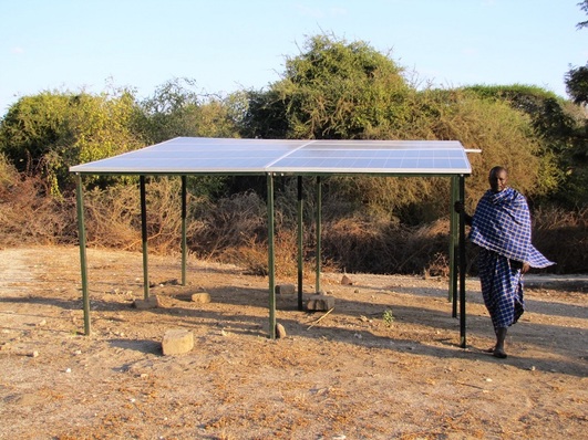 Maasai man with the solar system in Ndedo.