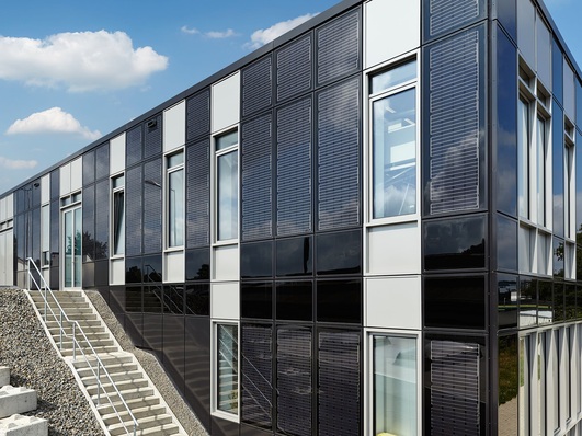 The solar modules are custom-built to architect specifications with individual designs.