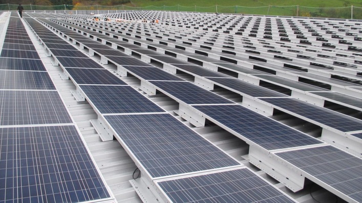 This solar roof shelters 1,160 parking spaces