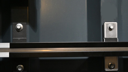 It's possible to cover the fastener with a metal sheet